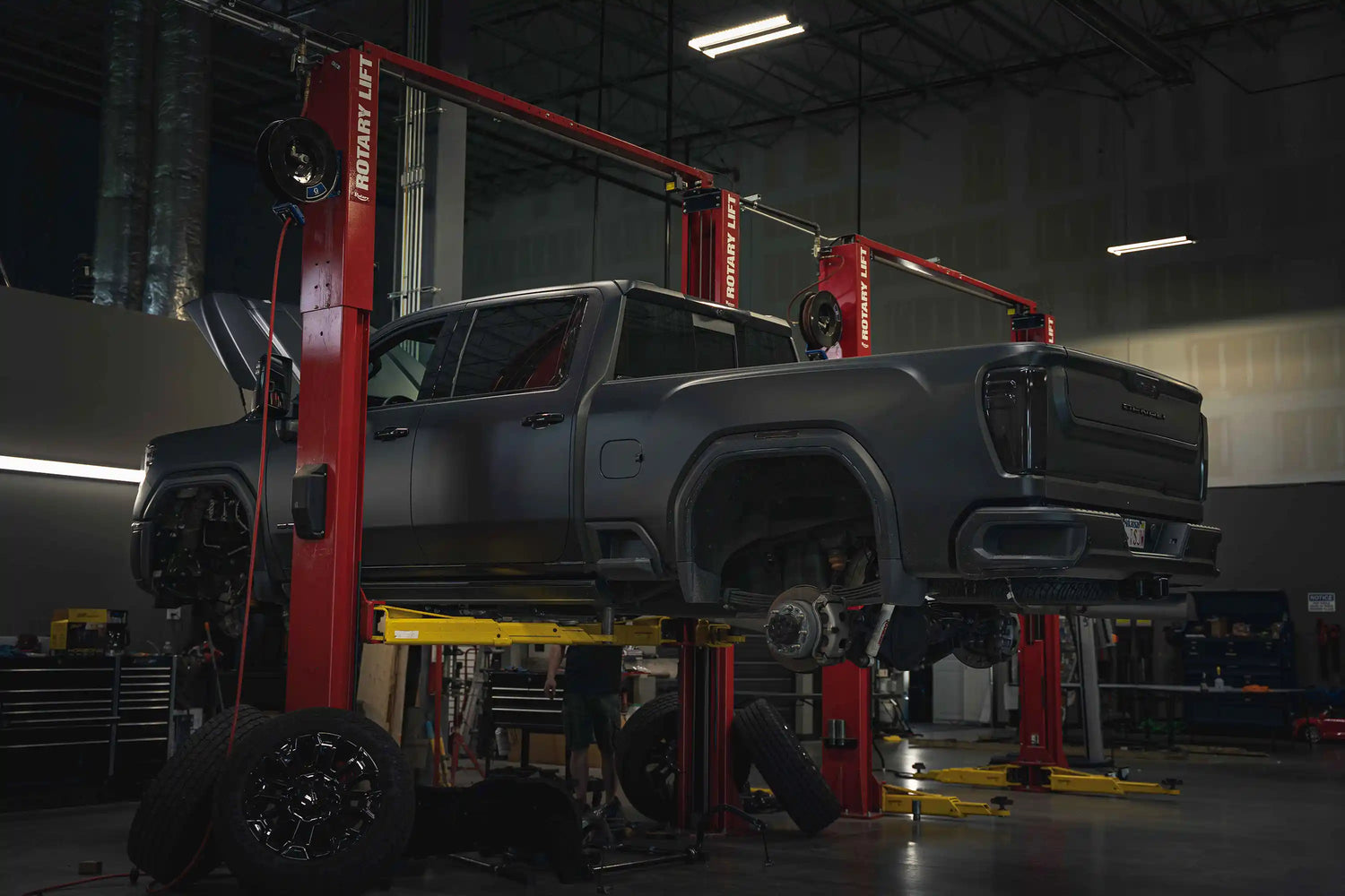 Truck on a vehicle lift at Starwood Custom Vehicles automotive services and commercial fleet upfitting shop in Northwest Arkansas serving Springdale, Fayetteville, Rogers, Bentonville, and the greater NWA area