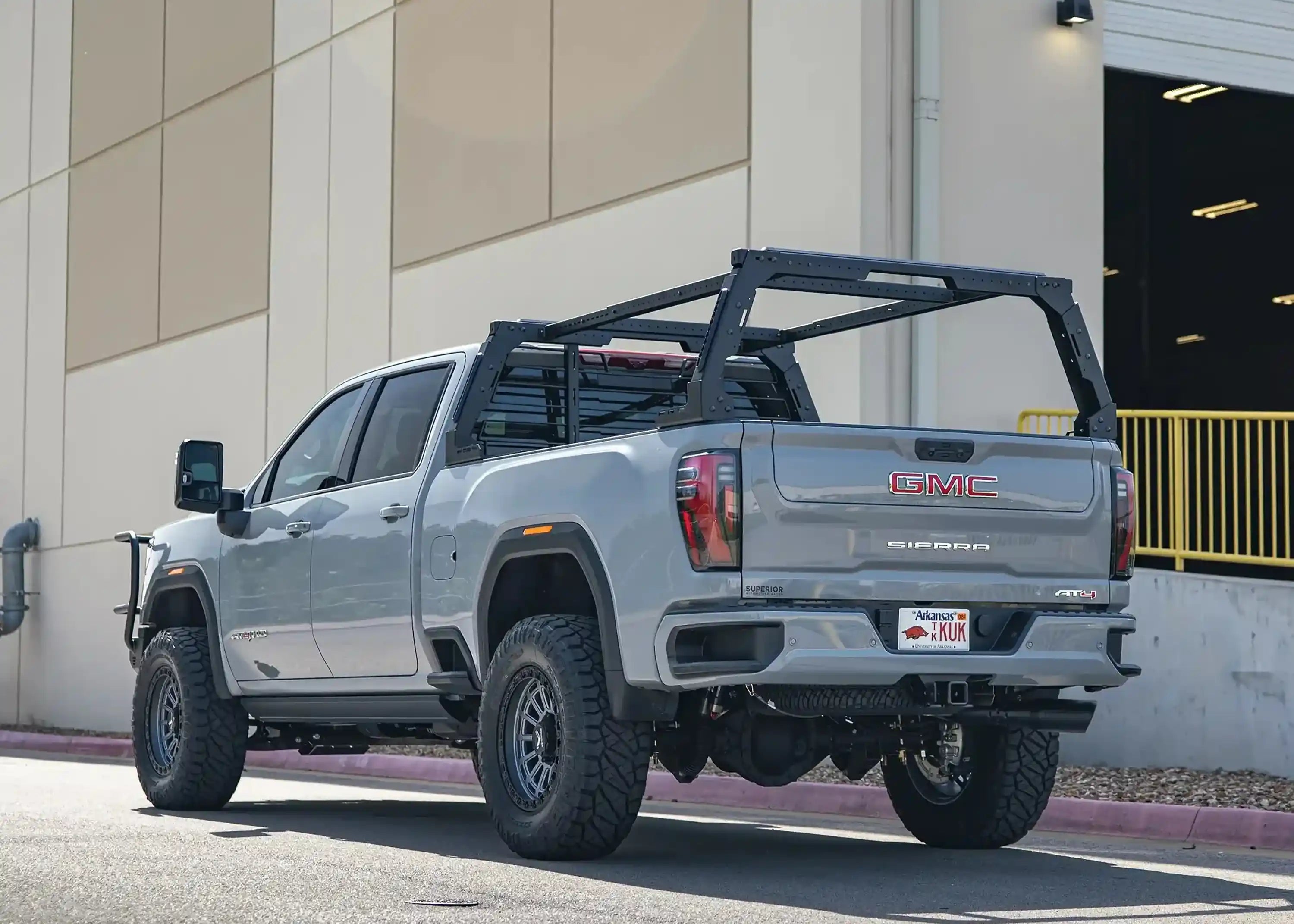 GMC pickup fitted with an ADAPT truck bed ladder rack by Starwood Custom Vehicles in Northwest Arkansas | upfitting trucks in Springdale, Rogers, Bentonville, Fayetteville and all of NWA