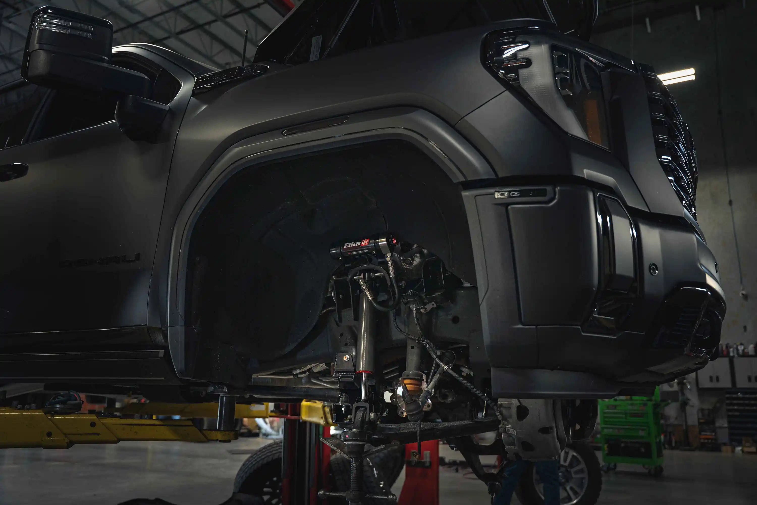 Truck being fitted with an off road suspension lift and leveling kit at Starwood Customs suspension shop in Northwest Arkansas | serving Bentonville, Rogers, Springdale, Fayetteville